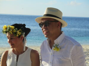 Close-up of couple on beach at vow renewal ceremony