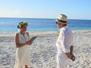 Wife reading vows as part of vow renewal ceremony