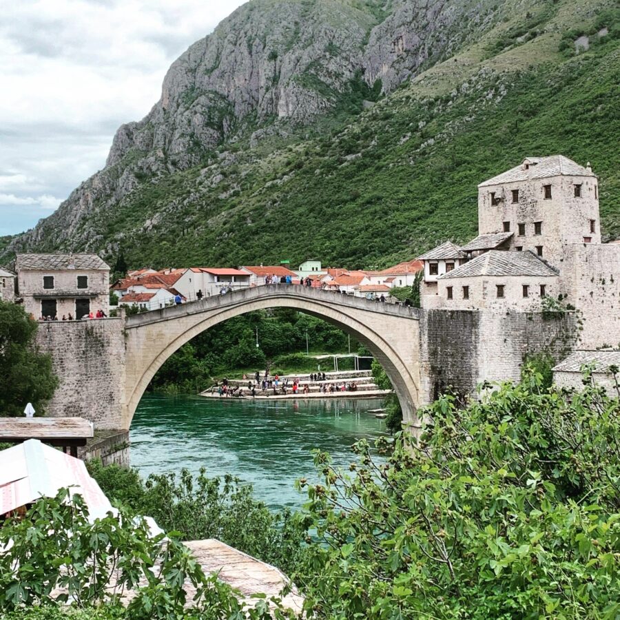 Historic bridge with buildings either side